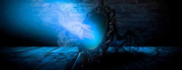 Wall Mural - Mirror magic, fortune telling and fulfillment of desires. Fantasy with a mirror, dark room, magical power, night view.