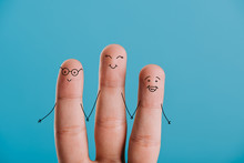 Cropped View Of Happy Human Fingers Holding Hands Isolated On Blue