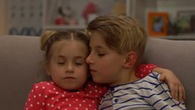 Little Brother And Sister Hugging, Boy Kissing Girl On Cheek Care, Slow Motion
