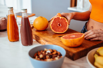 Wall Mural - Delicious tasty grapefruit lying on the cutting board