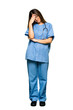 © luismolinero - Full body of Young nurse with tired expression