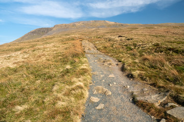 Ingleborough (723 m or 2,372 ft) is the second-highest mountain in the Yorkshire Dales. It is one of the Yorkshire Three Peaks (the other two being Whernside and Pen-y-ghent).