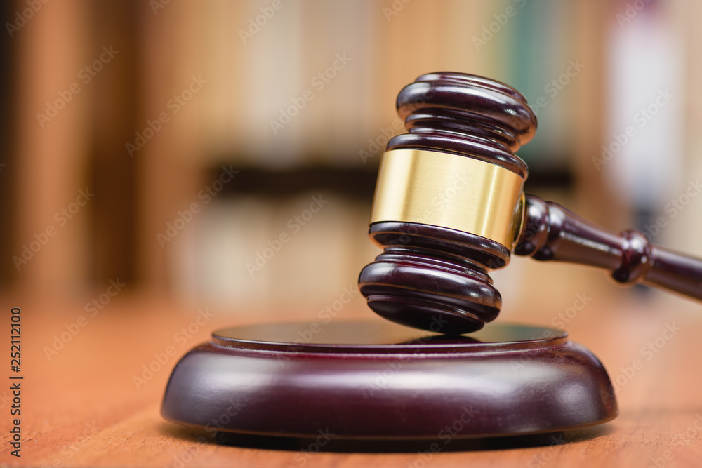 Justice and law concept. Wooden hammer of the judge. Court and decision. Judge hammer on the wooden table. Stock Photo Adobe Stock