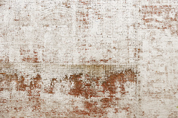 Old red brick wall with white paint background