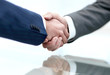 © ASDF - Business men making handshake. Business concept.