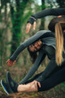 © GAGO IMAGES - Two young beautiful woman exercise in the forest