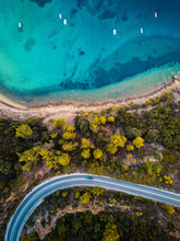 Aerial Photo Of A Road Near The Sea