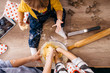 © Westend61 - Mother and children preparing dough together