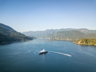 Aerial view of a beautiful Ocean Inlet in the Modern City during a sunny summer day. Taken in Deep Cove, North Vancouver, BC, Canada.