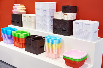 Plastic household containers in store