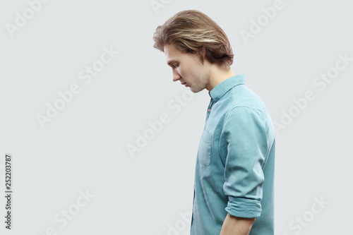 Profile Side View Portrait Of Sad Handsome Long Haired Blonde