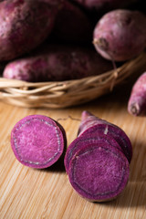 Wall Mural - Sweet Potatoes Purple Colored on Table