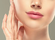 © Utkamandarinka - Woman lips chin neck beautiful skin age care
