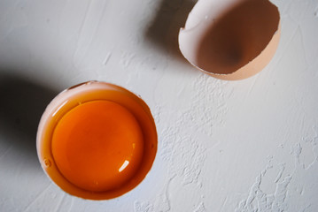 Wall Mural - Chicken eggs on a blue background