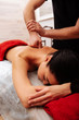 © zinkevych - Male master of SPA center giving professional strong massage