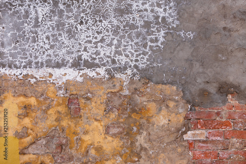 Texture Of Old Brick Wall With Yellow Plaster Canvas Print