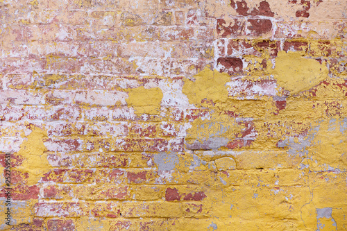 Texture Of Old Brick Wall With Yellow Plaster Canvas Print