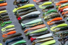 Different In Color And Size Fishing Lures On The Table