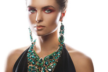 Sexy Woman Wearing Big Beautiful Necklace And Earrings With A Lot Of Gems