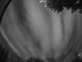 Wall Mural - time lapse of clouds and stars that move around the pole , taken with special mono camera.