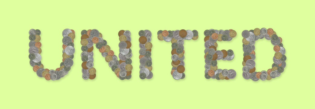 UNITED – Coins on green background