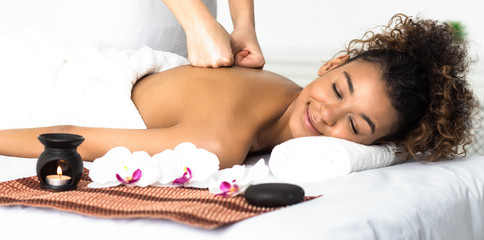 Wall Mural - Woman enjoying aroma massage in spa salon