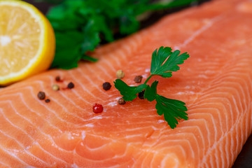 Wall Mural - Fresh fish, salmon fillet with vegetables top view, tasty and healthy food