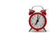 © rdaniluk - Red clock on white background.