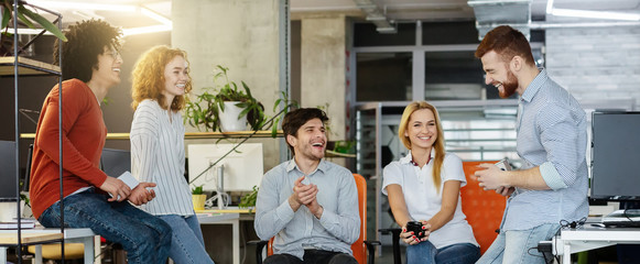 Poster - Creative team having discussion on new design project in office