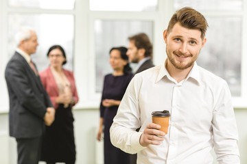 Wall Mural - Handsome young businessman at his office