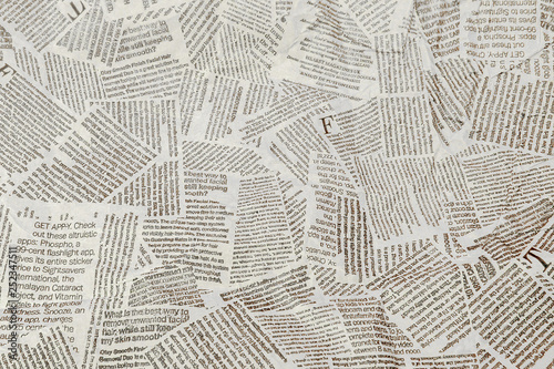 Fotografía Black and white repeating torn newspaper background