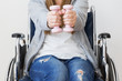 © AnastazjaSoroka - Disabled woman exercising with dumbells.