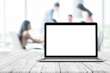 Poster - Laptop blank mock up screen placed on white wooden table on blurred people meeting in coffee shop cafe co-working space