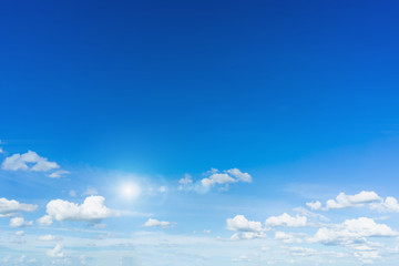 blue sky and clouds with sun and daylight natural background.