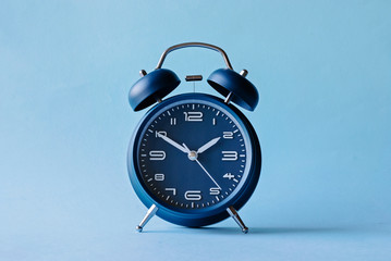 Wall Mural - retro style blue alarm clock with bells