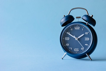 Wall Mural - retro style blue alarm clock with bells