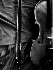 The abstract art design background of violin and bow