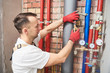 © Kadmy - plumber installing and mounting water equipment - meter, filter and pressure reducer