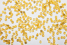 Background Of Yellow Amber Beads.Texture Of Yellow Beads.