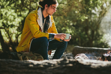 Close up of a man camping in forest