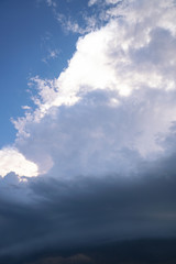 Wall Mural - Scary epic sky with menacing clouds. Hurricane wind with a thunderstorm. Stock background, photo