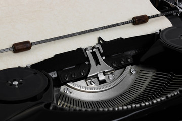 Fototapete - Old retro vintage black typewriter close up cropped view on details