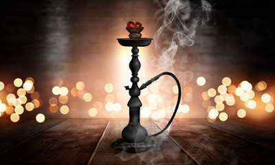 Hookah in a dark room with smoke, abstract bokeh light, wooden table, wet asphalt, reflection.