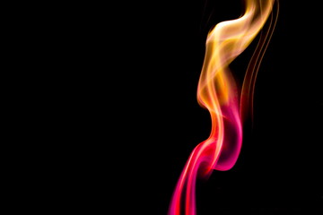 Colored smoke on black background