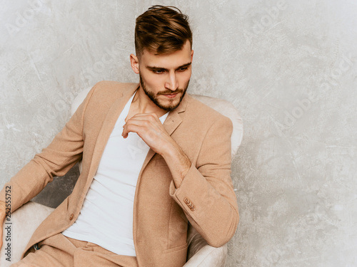 Featured image of post Sitting Male Model Suit Poses / Your model can just sit relaxed in the chair, while you are shooting him from various angles.