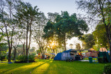 Fototapeta  - Camping and tent in nature park with sunrise