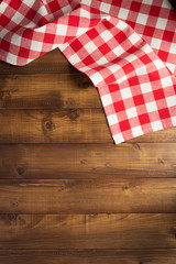 Poster - checked cloth napkin at wooden table