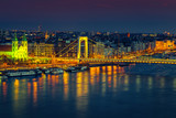Fototapeta Miasta - Beautiful Elisabeth bridge and Pest cityscape at evening, Budapest, Hungary