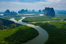 Aerial Drone View Of Towering Limestone Cliffs And Mangrove Forest In Phang Nga Bay, Thailand