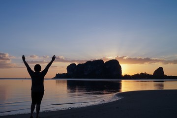 Poster - silhouette of a woman on the beach